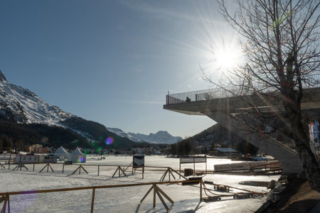 Saint Moritz, Switzerland, February 21, 2023 Platform for tourists to spot over the frozen lake on a sunny dayのeditorial素材