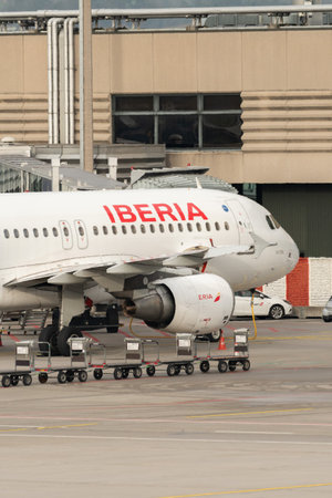 Zurich, Switzerland, January 2, 2023 Iberia Airbus A320-214 aircraft is parking at the gateのeditorial素材