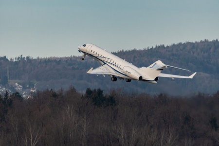 Zurich, Switzerland, January 2, 2023 Bombardier Global 6000 business aircraft leaving from runway 28のeditorial素材