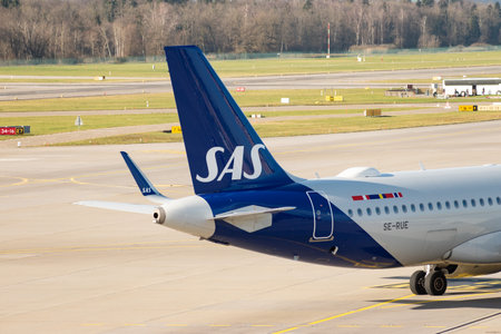 Zurich, Switzerland, January 2, 2023 SAS Scandinavian logo and symbol on the rudder of an Airbus A320-251N aircraftのeditorial素材