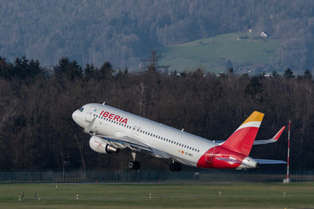 Zurich, Switzerland, January 2, 2023 Iberia Airbus A320-214 aircraft departing from runway 28のeditorial素材