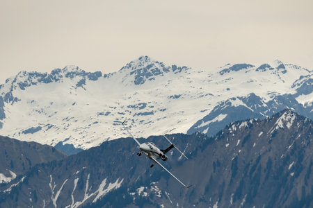 Rhine Valley, Saint Gallen, Switzerland, May 20, 2023 T7-CBW Embraer EMB-500 Phenon 100 aircraft performance during an air display seen from the top of the mount hoher Kastenのeditorial素材