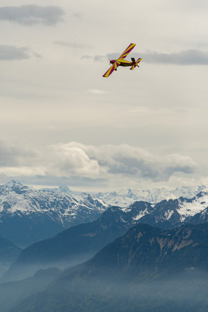 Rhine Valley, Saint Gallen, Switzerland, May 20, 2023 N-283SW Pilatus PC-6/350-H2 Porter propeller airplane performance during an air show seen from the top of the mount hoher Kastenのeditorial素材