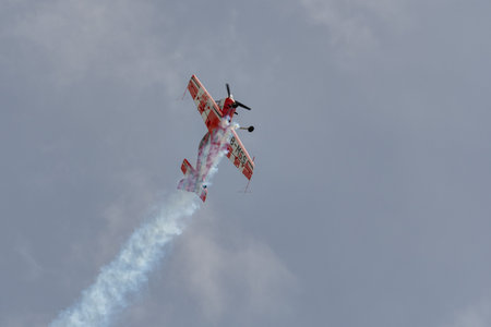 Rhine Valley, Saint Gallen, Switzerland, May 20, 2023 HB-MSS Sukhoi SU-26M propeller airplane is...