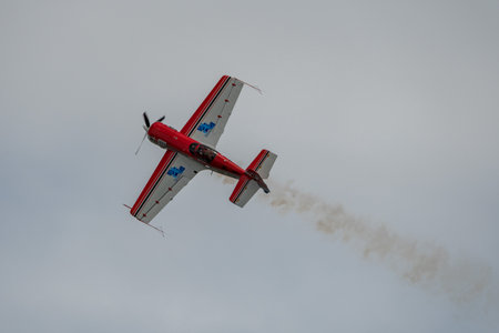 Rhine Valley, Saint Gallen, Switzerland, May 20, 2023 HB-MSS Sukhoi SU-26M propeller airplane is...