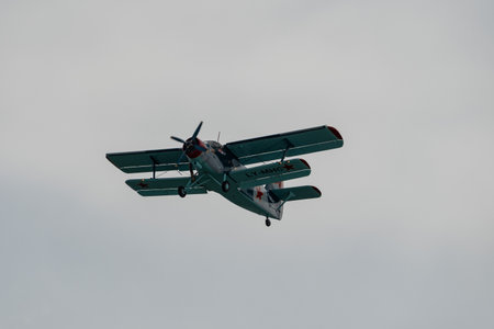 Rhine Valley, Saint Gallen, Switzerland, May 20, 2023 LY-MHC Antonov AN-2 double decker propeller...