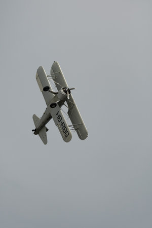 Rhine Valley, Saint Gallen, Switzerland, May 20, 2023 HB-RBG Boeing Stearman Model 75 double decker...