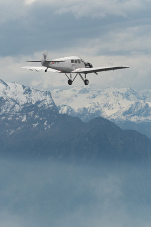 Rhine Valley, Saint Gallen, Switzerland, May 20, 2023 HB-RIO Junkers F13 rebuilt nostalgic propeller airplane performance during an air show seen from the top of the mount hoher Kastenのeditorial素材