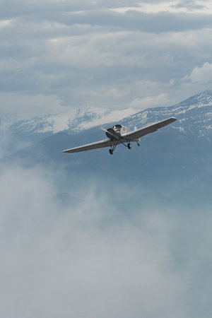 Rhine Valley, Saint Gallen, Switzerland, May 20, 2023 HB-RIO Junkers F13 rebuilt nostalgic propeller airplane performance during an air show seen from the top of the mount hoher Kastenのeditorial素材