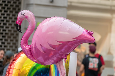 Zurich, Switzerland, June 17, 2023 Pink flamingo balloon at the pride festival in the city centerのeditorial素材