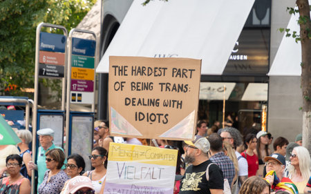 Zurich, Switzerland, June 17, 2023 Protesters in the city center holding up their sign with a...
