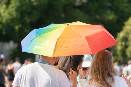 Zurich, Switzerland, June 17, 2023 Rainbow colored gender umbrella during the pride demonstration in...