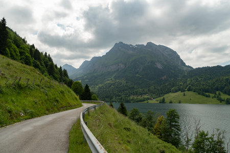 Waegital, Canton Schwyz, Switzerland, June 13, 2023 Fantastic view over the beautiful lake Waegitalersee surrounded by the majestic swiss alps on a sunny dayの写真素材