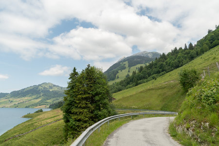 Waegital, Canton Schwyz, Switzerland, June 13, 2023 Fantastic view over the beautiful lake Waegitalersee surrounded by the majestic swiss alps on a sunny dayの写真素材