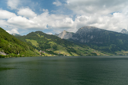 Waegital, Canton Schwyz, Switzerland, June 13, 2023 Fantastic view over the beautiful lake Waegitalersee surrounded by the majestic swiss alps on a sunny dayの写真素材