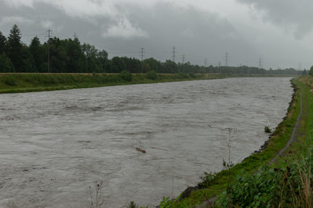 Bendern, Liechtenstein, August 28, 2023 Strong flood at the rhine river during a severe rain showerの写真素材