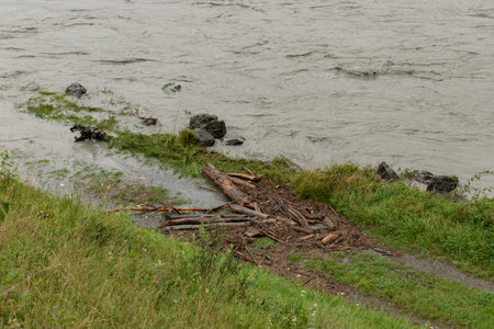 Gamprin, Liechtenstein, August 28, 2023 Strong flood at the rhine river during a severe rain showerの写真素材