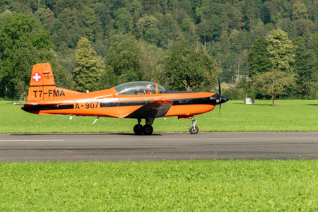Mollis, Switzerland, August 18, 2023 Pilatus PC-7 propeller aircraft is taxiing on the runwayのeditorial素材