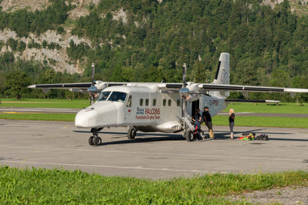 Mollis, Switzerland, August 18, 2023 C-FPSH Dornier 228-202 aircraft is parking on the apronのeditorial素材