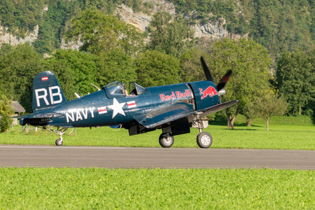 Mollis, Switzerland, August 18, 2023 OE-EAS Chance Vought F4U-4 Corsair aircraft is taxiing on the runwayのeditorial素材