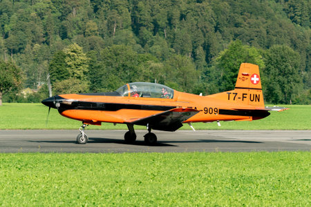 Mollis, Switzerland, August 18, 2023 Pilatus PC-7 propeller aircraft is taxiing on the runwayのeditorial素材