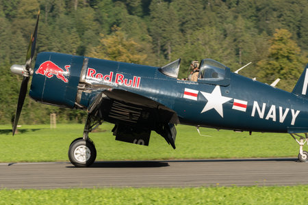 Mollis, Switzerland, August 18, 2023 OE-EAS Chance Vought F4U-4 Corsair aircraft on the runway 19のeditorial素材