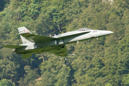 Mollis, Switzerland, August 18, 2023 Swiss military McDonnell Douglas F/A-18 Hornet jet is performing acrobatics during an air displayのeditorial素材