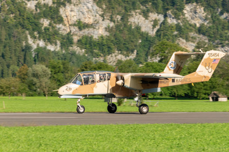 Mollis, Switzerland, August 18, 2023 F-AZKM North american OV-10B Bronco aircraft on runway 19のeditorial素材