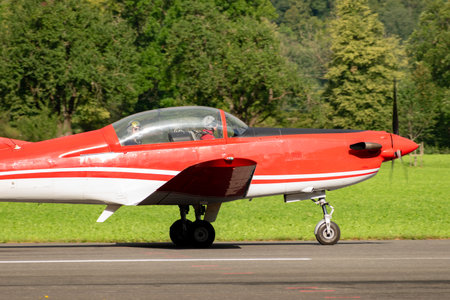 Mollis, Switzerland, August 18, 2023 Pilatus PC-7 propeller aircraft is taxiing on the runwayのeditorial素材