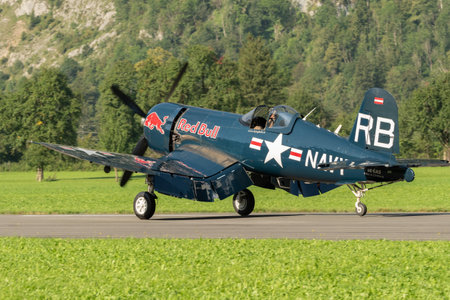 Mollis, Switzerland, August 18, 2023 OE-EAS Chance Vought F4U-4 Corsair aircraft on the runway 19のeditorial素材