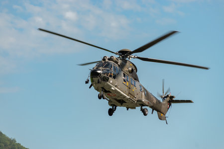 Mollis, Switzerland, August 18, 2023 Swiss military super puma helicopter during an air displayのeditorial素材