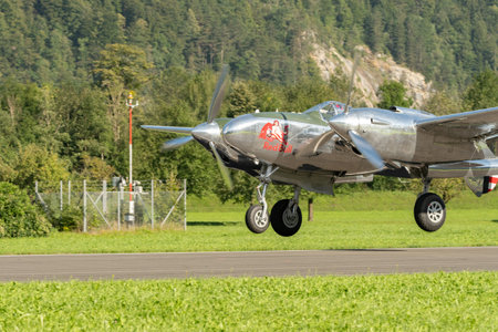 Mollis, Switzerland, August 18, 2023 N-25Y Lockheed P-38L Lightning aircrafton the runwayのeditorial素材