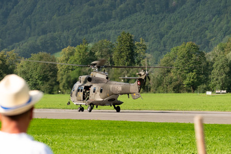 Mollis, Switzerland, August 18, 2023 Swiss military super puma helicopter during an air displayのeditorial素材