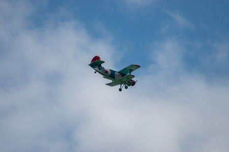 Mollis, Switzerland, August 18, 2023 LY-MHC Antonov AN-2 historic double decker aircraft in the blue skyのeditorial素材