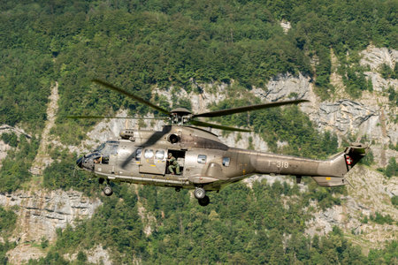 Mollis, Switzerland, August 18, 2023 Swiss military super puma helicopter during an air displayのeditorial素材