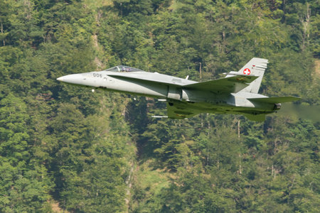 Mollis, Switzerland, August 18, 2023 Swiss military McDonnell Douglas F/A-18 Hornet jet is performing acrobatics during an air displayのeditorial素材