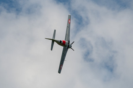 Mollis, Switzerland, August 18, 2023 D-ESUI Pilatus P-3-05 propeller aircraft is performing during an air showのeditorial素材