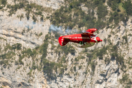 Mollis, Switzerland, August 18, 2023 N-8671 Pitts S-1S special propeller aircraft is performing acrobatics during an air displayのeditorial素材
