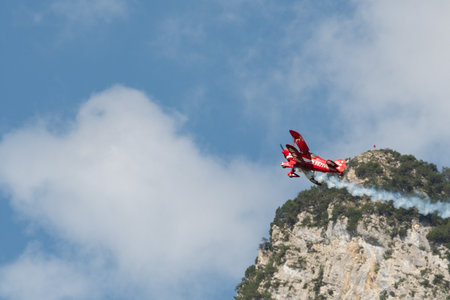 Mollis, Switzerland, August 18, 2023 N-8671 Pitts S-1S special propeller aircraft is performing acrobatics during an air displayのeditorial素材
