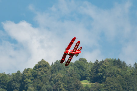 Mollis, Switzerland, August 18, 2023 N-8671 Pitts S-1S special propeller aircraft is performing acrobatics during an air displayのeditorial素材