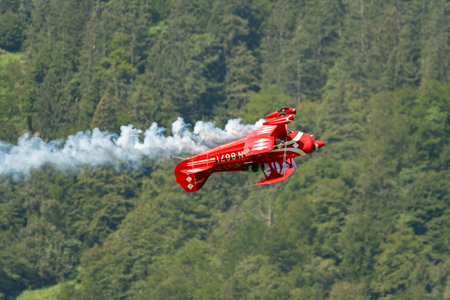 Mollis, Switzerland, August 18, 2023 N-8671 Pitts S-1S special propeller aircraft is performing acrobatics during an air displayのeditorial素材