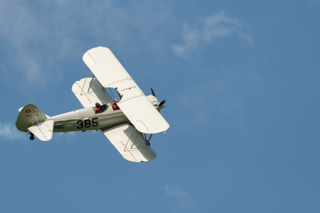 Mollis, Switzerland, August 18, 2023 HB-RBG Boeing E75 Stearman historic double decker aircraft performance during an air showのeditorial素材
