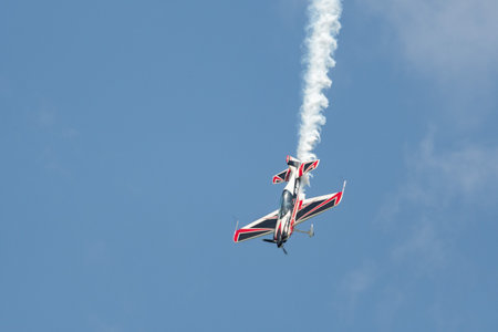 Mollis, Switzerland, August 18, 2023 HB.MAD Xtreme Air XA-42 aircraft is doing acrobatics during an air displayのeditorial素材