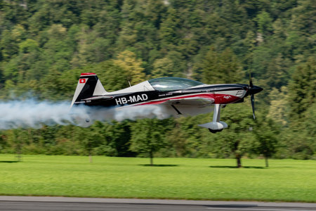 Mollis, Switzerland, August 18, 2023 HB.MAD Xtreme Air XA-42 aircraft is doing acrobatics during an...
