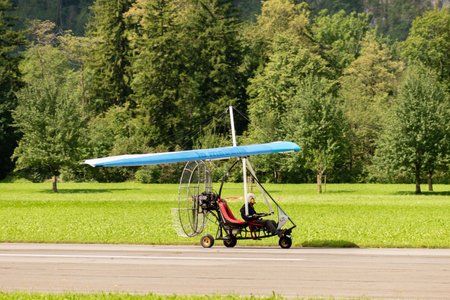 Mollis, Switzerland, August 18, 2023 Ultralight aircraft during an air displayのeditorial素材