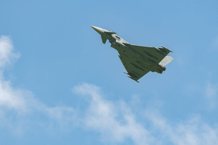 Mollis, Switzerland, August 18, 2023 Eurofighter Typhoon military jet is performing acrobatics during an air displayのeditorial素材