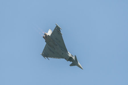 Mollis, Switzerland, August 18, 2023 Eurofighter Typhoon military jet is performing acrobatics...