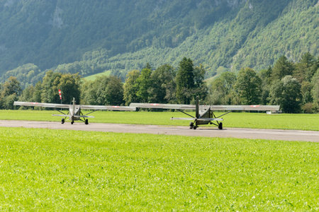 Mollis, Switzerland, August 18, 2023 Pilatus PC-6/B2 Turbo Porter propeller aircraft taxiing on the runwayのeditorial素材