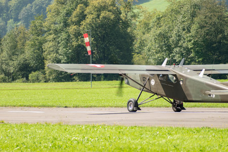 Mollis, Switzerland, August 18, 2023 Pilatus PC-6/B2 Turbo Porter propeller aircraft taxiing on the runwayのeditorial素材