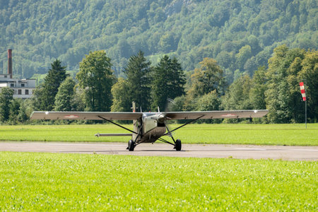 Mollis, Switzerland, August 18, 2023 Pilatus PC-6/B2 Turbo Porter propeller aircraft taxiing on the runwayのeditorial素材